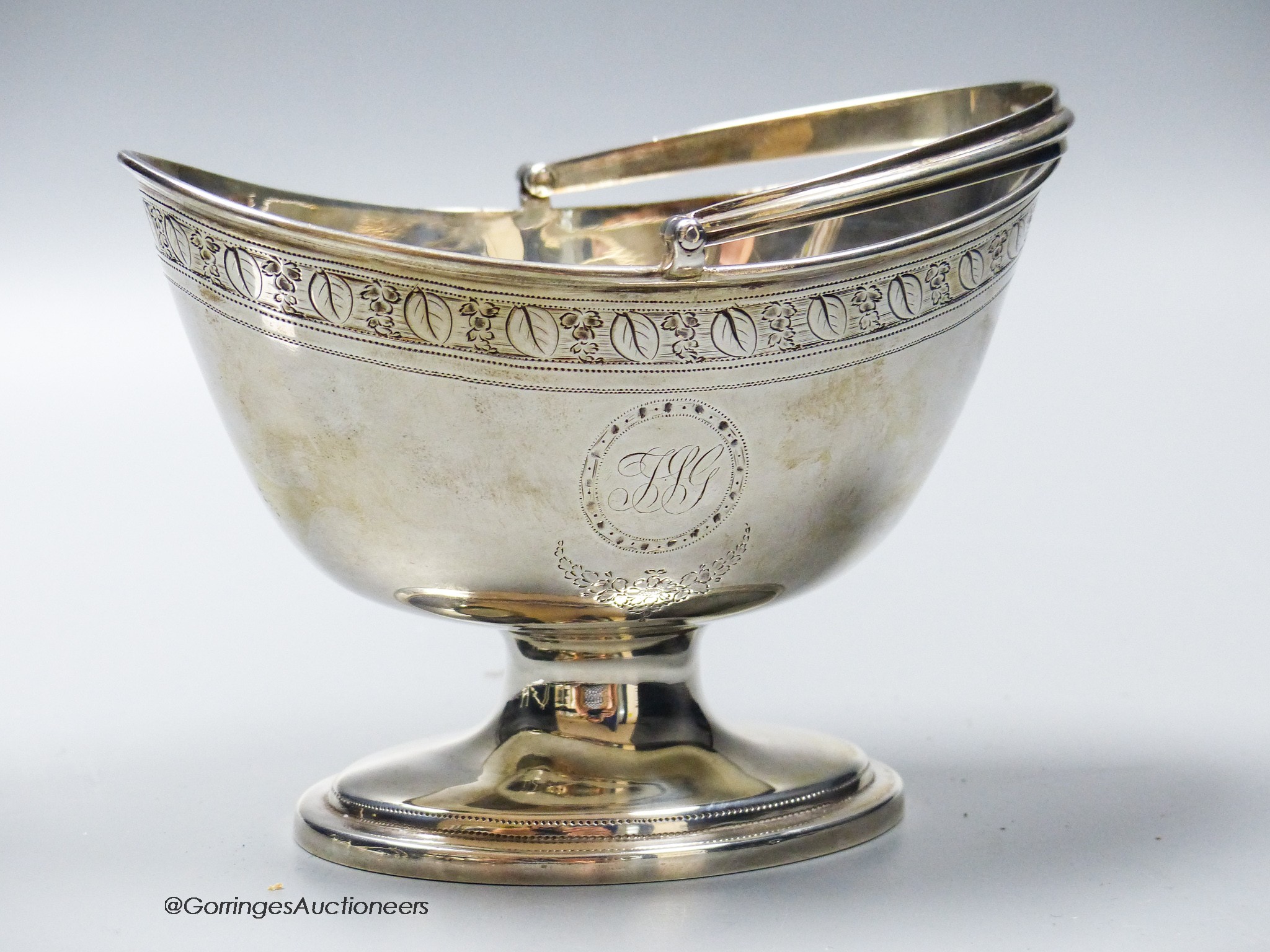 A George III engraved silver oval pedestal sugar basket, Charles Aldridge, London, 1797, length 13.8cm, 6oz.